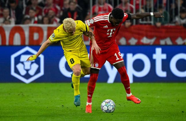September 10, 2026, xemx, Soccer, UEFA Champions League, FC Bayern Munich vs. FK Bodø Glimt, Sondre Auklend (FK Bodø Glimt), Alphonso Davies (FC Bayern Munich), tackle, action, battle for the ball, Munich