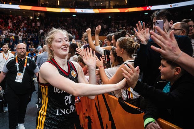 FIBA Women’s Basketball World Cup 2026: Belgium vs. Germany, September 10, 2026—Frieda Bühner of Germany, 20, high-fives the fans; Germany advances to the semifinals; after the game—FIBA Women’s Basketball World Cup 2026, Final Phase, Quarterfinals: Belgium vs. Germany on September 10, 2026, at the Uber Arena, Berlin Copyright: xBEAUTIFULxSPORTS Tonhäuserx