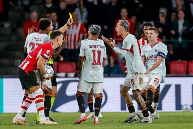 EINDHOVEN, NETHERLANDS - SEPTEMBER 10: Isaque of Shakhtar receives a yellow card from referee Umut Meler during the UEFA Champions League match between PSV Eindhoven and FC Shakhtar Donetsk at PSV Stadion on September 10, 2026 in Eindhoven, Netherlands.  Copyright: xMTB MBxMediax