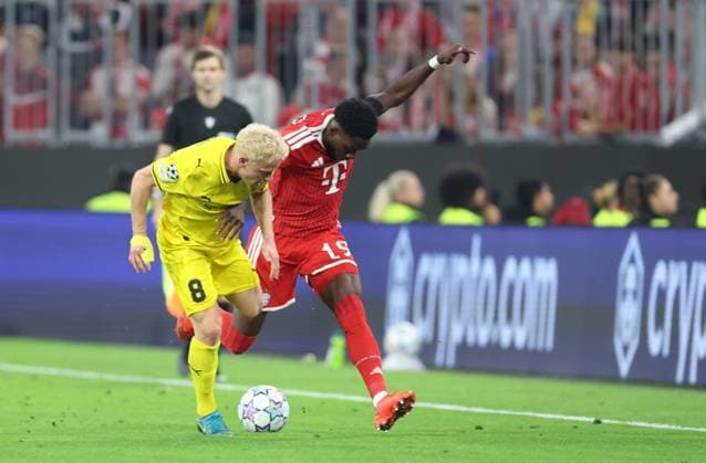 September 10, 2026, GER, Soccer, Men s, UEFA Champions League, Group Stage, 2026–2027 Season, Matchday 1, FC Bayern Munich vs. FK Bodø Glimt: Sondre Auklend (FK Bodø Glimt 08) in a duel with Alphonso Davies, FC Bayern Munich 19, Munich, Allianz Arena, Bavaria, Germany Copyright: xNordphoto Schneiderx