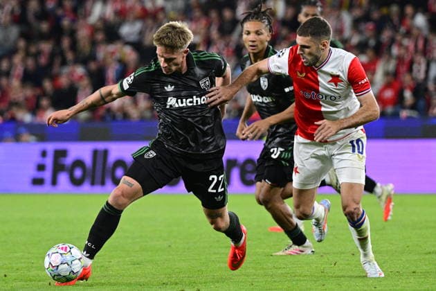 From left Michal Skoras of Lens and Danijel Sturm of Slavia in action during the Football Champions League opening round match Slavia Prague vs RC Lens on September 10, 2026, in Prague, Czech Republic. (CTKxPhoto VitxSimanek) CTKPhotoP2026091010470  CTKPhotoP2026091010470