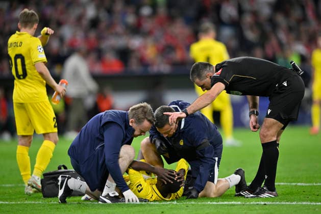 Joshua Kitolano, FK Bodø Glimt 16, had to leave the field due to injury; Referee Rade Obrenovic (SVN); FC Bayern Munich (FCB) vs. Bodø Glimt, September 10, 2026; DFL regulations prohibit any use of photographs as imagesSEQUENCES AND OR QUASI-VIDEO FC Bayern Munich (FCB) vs. Bodø Glimt