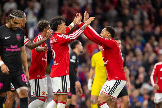 Lisandro Martinez and Matheus Cunha seen celebrating after goal during UEFA Champions League 2026 2027 league phase game between teams of Manchester United, ManU and Sabah FC (Ernest Kolodziej Ball Raw Images) Manchester Old Trafford England Copyright: xErnestxKolodziejx ernestkolodziej_manchester_sabah_2627_OL_2858
