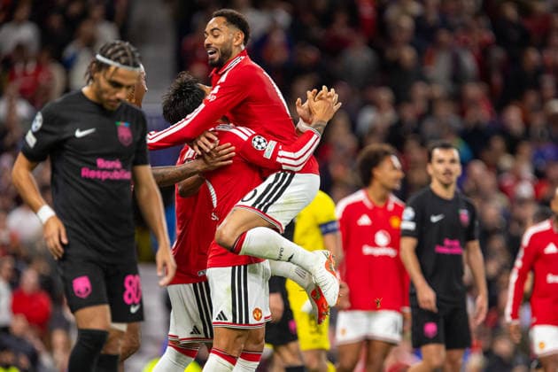 Lisandro Martinez and Matheus Cunha seen celebrating after goal during UEFA Champions League 2026 2027 league phase game between teams of Manchester United, ManU and Sabah FC (Ernest Kolodziej Ball Raw Images) Manchester Old Trafford England Copyright: xErnestxKolodziejx ernestkolodziej_manchester_sabah_2627_OL_2864