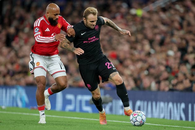 Manchester United, ManU v Sabah FC - UEFA Champions League 2026 27 League Phase MD1 Bryan Mbeumo of Manchester United and Tymoteusz Puchacz of Sabah challenge during the UEFA Champions League 2026 27 League Phase MD1 match between Manchester United and Sabah FC at Old Trafford on September 10, 2026 in Manchester, England. Manchester Old Trafford England United Kingdom Copyright: xAllstarxPicturexLibraryxLtdx