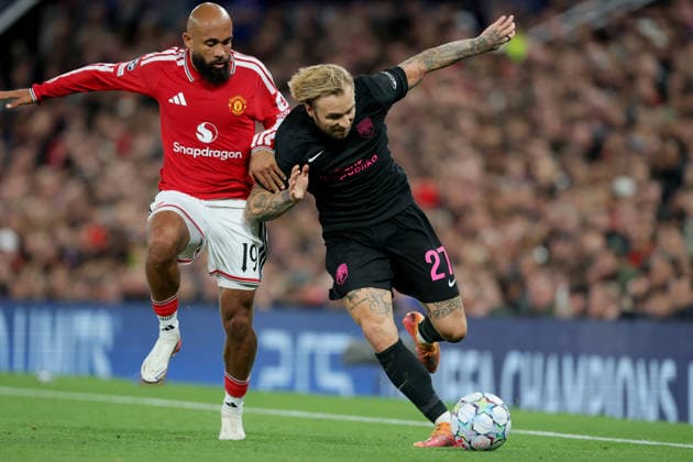Manchester United, ManU v Sabah FC - UEFA Champions League 2026 27 League Phase MD1 Bryan Mbeumo of Manchester United and Tymoteusz Puchacz of Sabah challenge during the UEFA Champions League 2026 27 League Phase MD1 match between Manchester United and Sabah FC at Old Trafford on September 10, 2026 in Manchester, England. Manchester Old Trafford England United Kingdom Copyright: xAllstarxPicturexLibraryxLtdx