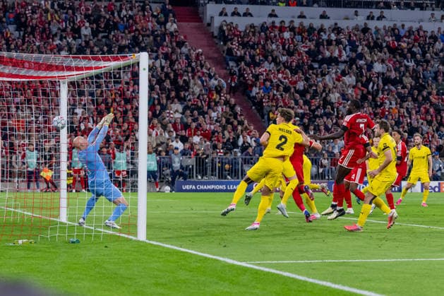 Harry Kane of FC Bayern Munich, No. 9, scoring his header to make it 2–0 against goalkeeper Julian Faye Lund of FK Bodo Glimt, 01, with Dayot Upamecano of FC Bayern Munich, 02 GER, FC Bayern Munich vs. FK Bodo Glimt, soccer, UEFA Champions League, group stage, Matchday 1, 2026–2027 season, September 10, 2026. DFL and DFB regulations prohibit any use of photographs as image sequences and or quasi-video. Photo: HMB Media, Heike Feiner Copyright: HMBxMedia HeikexFeiner