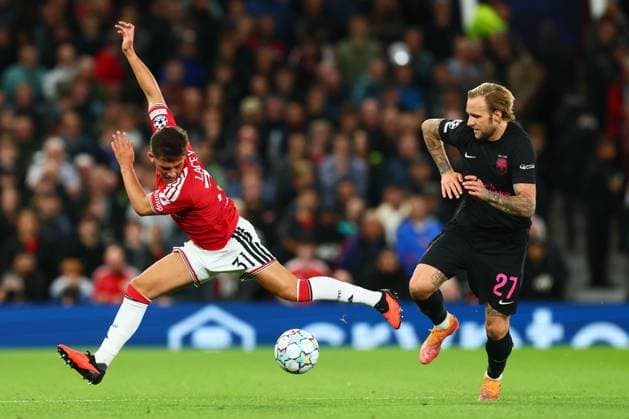 Shea Lacey of Manchester United, ManU and Tymoteusz Puchacz of Sabah Manchester United v Sabah, UEFA Champions League, Football, Old Trafford, UK - 10 Sep 2026Manchester Old Trafford United Kingdom  Copyright: xPaulxCurrie Shutterstockx 17144908bo