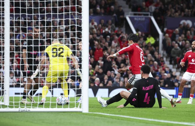 Manchester United, ManU v Sabah, UEFA Champions League, League Stage 10.09.26 Manchester United v Sabah, UEFA Champions League, League Stage Bradley Ormesher The Times Lisandro Martinez of Manchester United scores and celebrates scoring his teams 4th goal  Copyright: xBradleyxOrmesherx NINTCHDBPICT001107214963