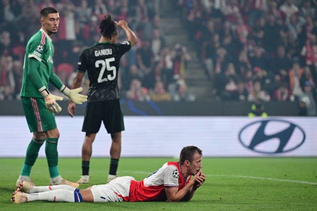 From left goalkeeper Robin Risser of Lens, Ismaelo Ganiou of Lens and Tomas Vlcek of Slavia lies on the ground after missing a scoring opportunity during the Football Champions League opening round match Slavia Prague vs RC Lens on September 10, 2026, in Prague, Czech Republic. (CTKxPhoto MichalxKamaryt) CTKPhotoP2026091010662  CTKPhotoP2026091010662