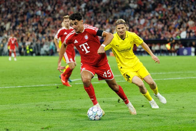 Aleksandar Pavlovic, 45, FC Bayern Munich, and Ulrik Saltnes, 14, FK Bodo Glimt, during the match between FC Bayern Munich and FK Bodo Glimt, soccer, men s, UEFA Champions League, 2026–2027, Matchday 1 on September 10, 2026, in Munich, Allianz Arena, Bavaria, Germany