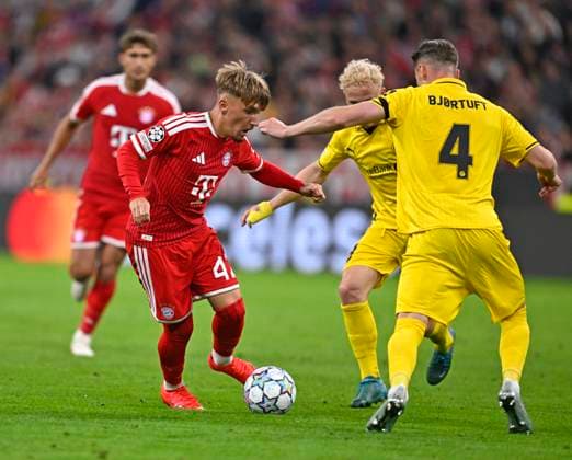 September 10, 2026, Soccer: UEFA Champions League 2026–2027, Matchday 1, FC Bayern Munich vs. FK Bodo Glimt, at the Allianz Arena in Munich; from left: Lennart Karl (FC Bayern Munich) vs. Odin Björtuft (FK Bodo Glimt)