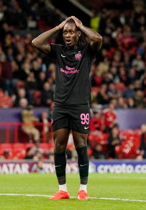 Manchester, England, 10th September 2026. Orphe Mbina of Sabah FC reacts to heading over the bar during the Manchester United, ManU vs Sabah UEFA Champions League match at Old Trafford, Manchester. Picture credit should read: Andrew Yates Sportimage EDITORIAL USE ONLY. No use with unauthorised audio, video, data, fixture lists, club league logos or live services. Online in-match use limited to 120 images, no video emulation. No use in betting, games or single club league player publications. SPI_062_AY_Man_Utd_Sabah SPI-4989-0062