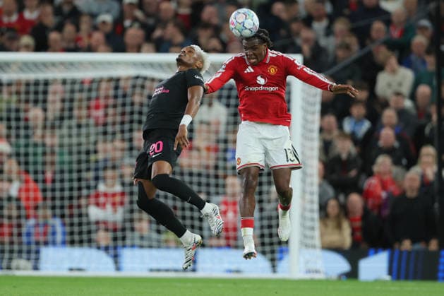 Manchester United, ManU v Sabah FC - UEFA Champions League 2026 27 League Phase MD1 Joy Lance Mickels of Sabah and Patrick Dorgu of Manchester United challenge during the UEFA Champions League 2026 27 League Phase MD1 match between Manchester United and Sabah FC at Old Trafford on September 10, 2026 in Manchester, England. Manchester Old Trafford England United Kingdom Copyright: xAllstarxPicturexLibraryxLtdx