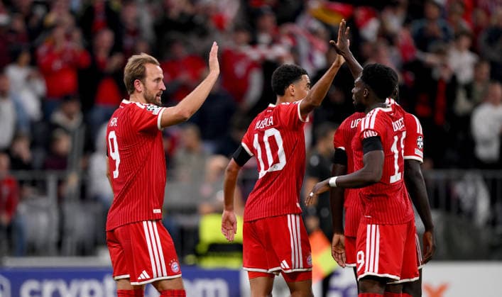 SOCCER CHAMPIONS LEAGUE 2026–2027 SEASON Preliminary Round 1 Match Day 10, September 2026 FC Bayern Munich vs. FK Bodø Glimt FC Bayern Munich celebrates after scoring the 2–0 goal, from left, goal scorers Harry Kane, Jamal Musiala, Alphonso Davies