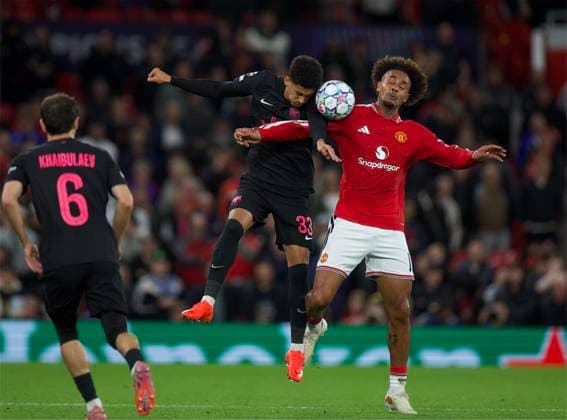 RECORD DATE NOT STATED Football - UEFA Champions League - Manchester United, ManU FC v Sabah FC MANCHESTER, ENGLAND - Thursday, September 10, 2026: Sabah FC s Erivaldo Almeida (L) challenges for a header with Manchester United s Joshua Zirkzee during the UEFA Champions League 2026 27 League Phase MD1 match between Manchester United FC and Sabah FC at Old Trafford. (Photo by David Rawcliffe Propaganda) MANCHESTER Old Trafford GREATER MANCHESTER ENGLAND  Copyright: xDavidxRawcliffex 2026-09-10-Man_Utd_v_Sabah-064