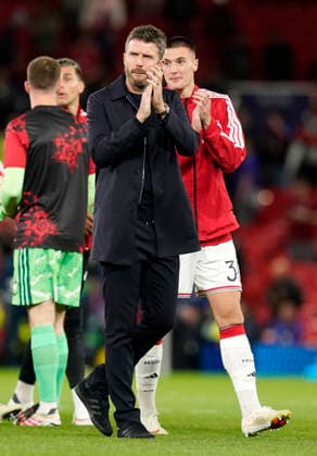 Manchester, England, 10th September 2026. Michael Carrick head coach of Manchester United, ManU claps the fans during the Manchester United vs Sabah UEFA Champions League match at Old Trafford, Manchester. Picture credit should read: Andrew Yates Sportimage EDITORIAL USE ONLY. No use with unauthorised audio, video, data, fixture lists, club league logos or live services. Online in-match use limited to 120 images, no video emulation. No use in betting, games or single club league player publications. SPI_066_AY_Man_Utd_Sabah SPI-4989-0064