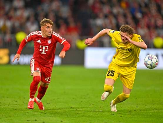 September 10, 2026, Soccer: UEFA Champions League 2026–2027, Matchday 1, FC Bayern Munich vs. FK Bodo Glimt, at the Allianz Arena in Munich; from left: Lennart Karl (FC Bayern Munich) vs. Isak Dybvik Määttä (FK Bodo Glimt)