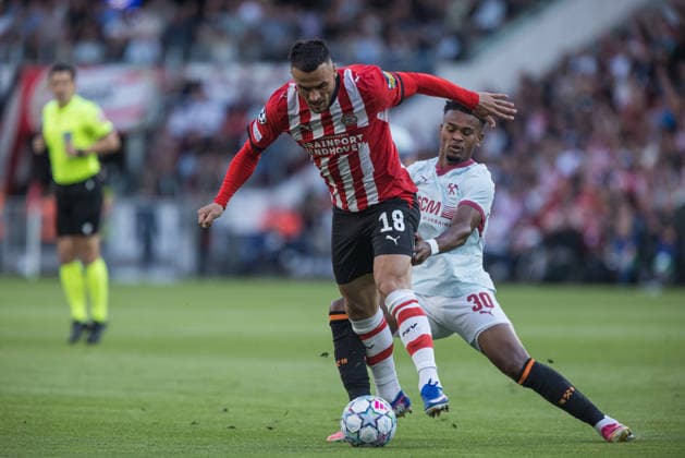 Filip Kostic and Alisson Santana seen during UEFA Champions League 26 27 League Phase - Matchday 1 match between teams of PSV Eindhoven and FC Shakhtar Donetsk (Jan Borys Ball Raw Images) Eindhoven Philips Stadion Netherlands Copyright: xJanxBorysx janborys_psv_shakhtar_2627-36