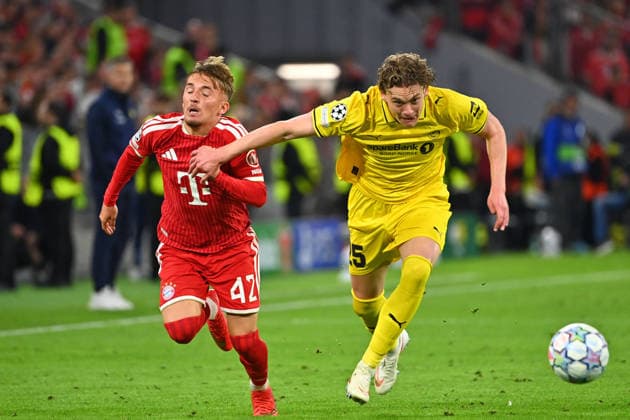 Lennart KARL, Bayern Munich, Action, Tackle against Isak Maeaettae, Glimt, Soccer, Champions League, 2026–27 Season, Group Stage: FC Bayern Munich vs. Bodo Glimt, 5–0 on September 10, 2026