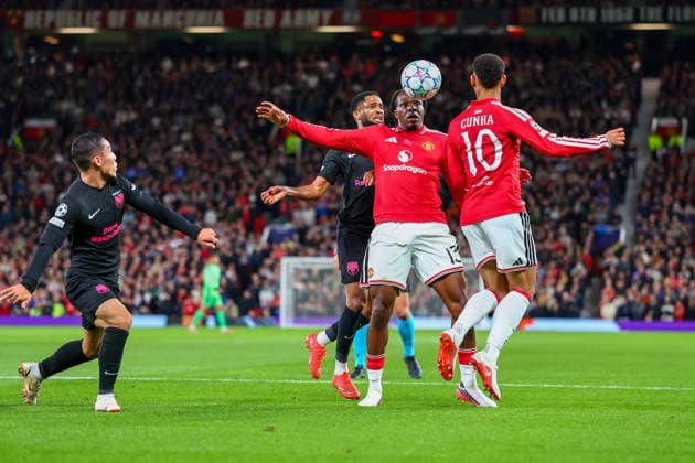 RECORD DATE NOT STATED 10th September 2026; Old Trafford, Manchester, England; UEFA Champions League Football, Manchester United, ManU versus Sabah; Patrick Dorgu of Manchester United traps the ball under pressure from Kaheem Parris of Sabah FK RogerxEvans