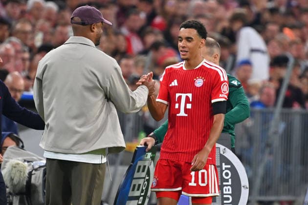 Coach Vincent KOMPANY of Bayern Munich with Jamal MUSIALA of Bayern Munich after being substituted in a Champions League soccer match, 2026–27 season, group stage: FC Bayern Munich vs. Bodø Glimt, 5–0 on September 10, 2026