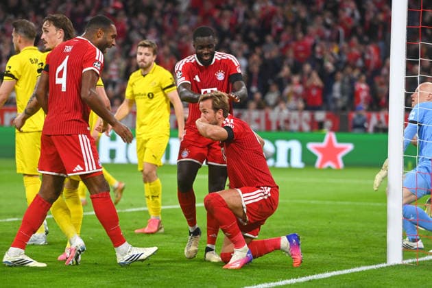 Goal celebration: Harry KANE (Bayern Munich) with Dayot UPAMECANO (Bayern Munich) and, on the left, Jonathan TAH (Bayern Munich)—celebration, joy, excitement, action—soccer, Champions League, 2026–27 season, Group stage: FC Bayern Munich vs. Bodo Glimt 5–0 on September 10, 2026