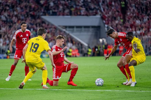 Battle for the ball: Tackle between Aleksandar Pavlovic (FC Bayern Munich, 45) and Joshua Kitolano (FK Bodo Glimt, 16); on the left, Joshua Kimmich (FC Bayern Munich, 06, GER), FC Bayern Munich vs. FK Bodo Glimt, soccer, UEFA Champions League, group stage, Matchday 1, 2026–2027 season, September 10, 2026 DFL DFB REGULATIONS PROHIBIT ANY USE OF PHOTOGRAPHS AS IMAGE SEQUENCES AND OR QUASI-VIDEO Photo: HMB Media, Heike Feiner Copyright: HMBxMedia HeikexFeiner