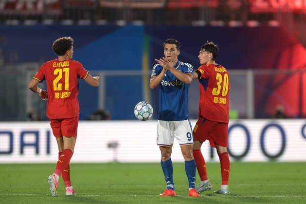 Como 1907 v RB Leipzig - UEFA Champions League - Season 2026-2027 Como, Italy, 10th September 2026. Anastasios Douvikas of Como 1907 encourages team mates as Andrija Maksimovic of RB Leipzig celebrates with Meil El Aynaoui of RB Leipzig after socring the reduce the arrears to 3-1 during the Como 1907 vs RB Leipzig UEFA Champions League, group phase match at Stadio Giuseppe Sinigaglia, Como. Picture credit should read: Jonathan Moscrop Como Stadio Giuseppe Sinigaglia Italy