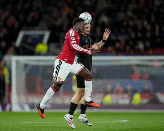 Manchester United, ManU v Sabah FK, UEFA Champions League Kobbie Mainoo of Manchester United competes for a header with Ivan Lepinjica of Sabah during the Manchester United v Sabah FK UEFA Champions League 1st Round match at Old Trafford, Manchester, England on 10 September 2026 Credit: Steve Flynn Every Second Media Editorial use only. All images are copyright Every Second Media Limited. No images may be reproduced without prior permission. Copyright: xIMAGO EveryxSecondxMediax ESM-2151-0145 StevexFlynnx xEveryxSecondxMediax