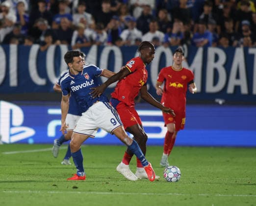 SOCCER - UEFA Champions League - Como 1907 vs. RB Leipzig Photo by IPA ABACAPRESS.COM88372425 - Anastasios Doubikas of Como 1907 and Ezechiel Banzuzi of RB Leipzig during the 2026–27 UEFA Champions League soccer match between Como 1907 and RB Leipzig on September 10, 2026, at Giuseppe Sinigaglia Stadium in Como, Italy. Photo by Nderim KACELI Como Italy  Copyright: xIPAxSport ABACAx