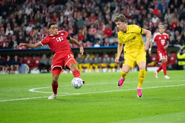 GER, Bavaria, Munich, Soccer, FC Bayern Munich vs. FK Bodo Glimt, at the Allianz Arena, Munich, Champions League, Group Stage, Matchday 1, September 10, 2026, from left: Jamal Musiala (FC Bayern Munich, No. 10) and Villads Nielsen (FK Bodo Glimt, No. 2), forwards on the attack. UEFA regulations prohibit any use of photographs as image sequences and or quasi-video, Copyright: HMB-Media MichaelxNibel