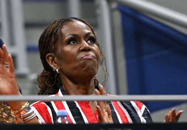 (260911) -- NEW YORK, Sept. 11, 2026 -- US former First Lady Michelle Obama watches the women s singles semifinal match between Aryna Sabalenka of Belarus and Jessica Pegula of the United States at the 2026 US Open tennis championships in New York, the United States, Sept. 10, 2026. ) (SP)U.S.-NEW YORK-TENNIS-US OPEN-WOMEN S SINGLES LixRui 