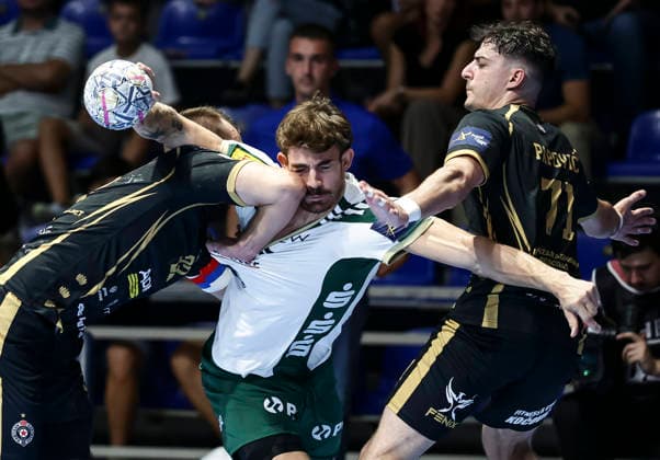Partizan v Fuchse Berlin - EHF Champions League Aymeric Zaepfel (C) of Fuchse Berlin in action against Milija Papovic (R) and Ivan Micic (L) of Partizan during the EHF Champions League Season 2026 2027 Group Phase match between RK Partizan v Fuchse Berlin at Aleksandar Nikolic Hall on September 10, 2026 in Belgrade, Serbia. Belgrade Serbia Copyright: xSrdjanxStevanovicx x