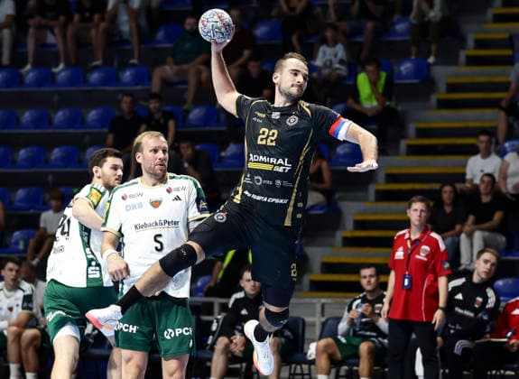 Partizan v Fuchse Berlin - EHF Champions League Ivan Micic (R) of Partizan in action against Max Darj (L) of Fuchse Berlin during the EHF Champions League Season 2026 2027 Group Phase match between RK Partizan v Fuchse Berlin at Aleksandar Nikolic Hall on September 10, 2026 in Belgrade, Serbia. Belgrade Serbia Copyright: xSrdjanxStevanovicx x