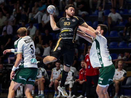Partizan v Fuchse Berlin - EHF Champions League Aljosa Damjanovic (C) of Partizan in action against Max Darj (L) and Lauro Pichiri of Fuchse Berlin during the EHF Champions League Season 2026 2027 Group Phase match between RK Partizan v Fuchse Berlin at Aleksandar Nikolic Hall on September 10, 2026 in Belgrade, Serbia. Belgrade Serbia Copyright: xSrdjanxStevanovicx x