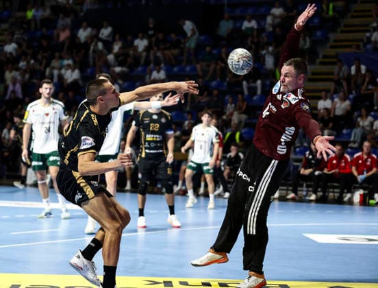 Partizan v Fuchse Berlin - EHF Champions League Lazar Andjelkovic (L) of Partizan in action against goalkeeper Andreas Palicka (R) of Fuchse Berlin during the EHF Champions League Season 2026 2027 Group Phase match between RK Partizan v Fuchse Berlin at Aleksandar Nikolic Hall on September 10, 2026 in Belgrade, Serbia. Belgrade Serbia Copyright: xSrdjanxStevanovicx x