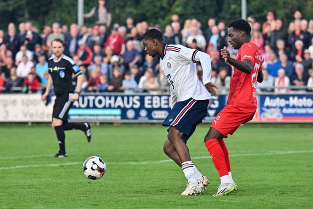 Bavarian Regional League: TSV Buchbach vs. FC Bayern Munich II, September 11, 2026, BUCHBACH, GERMANY September 11: In a showdown between Allen Junior LAMBE (FC Bayern Munich II) and Daniel MUTEBA (TSV Buchbach), the score was 8–23 during the Bavarian Regional League match between TSV Buchbach and FC Bayern’s reserves on Matchday 8 at the SMR Arena Copyright: xBEAUTIFULxSPORTS Goldbergx