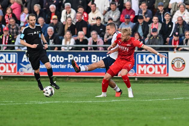 Bavarian Regional League: TSV Buchbach vs. FC Bayern Munich II, September 11, 2026, BUCHBACH, GERMANY September 11: Yll GASHI (FC Bayern Munich II 9) and Jonas WIESELBERGER (TSV Buchbach 37) during the Bavarian Regional League match between TSV Buchbach and FC Bayern’s reserve team on Matchday 8 at the SMR Arena Copyright: xBEAUTIFULxSPORTS Goldbergx