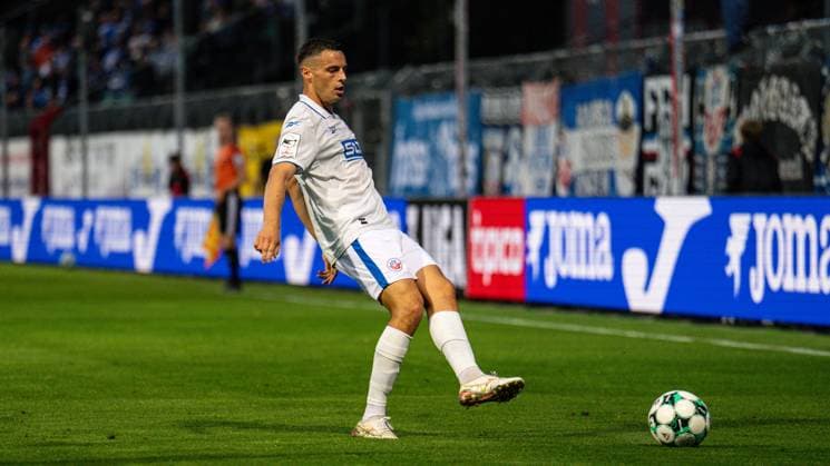 September 11, 2026, 3. Liga, Viktoria Köln vs. Hansa Rostock at Sportpark Höhenberg; Kenan Fatkic (Hansa Rostock) with the ball at his feet. IMPORTANT NOTICE: In accordance with DFB and DFL regulations, it is prohibited to use or allow the use of photographs taken in the stadium and or during the game in the form of sequential images and or video-like photo series Copyright: xJordyxFourgonx
