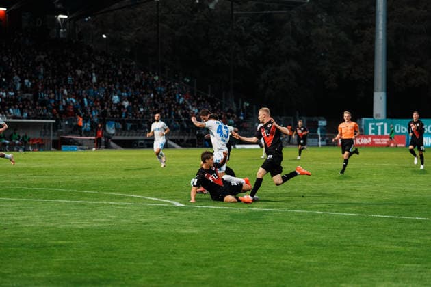 Germany, Soccer, Men s 3rd Division 2026–2027, Matchday 5: FC Viktoria Köln vs. FC Hansa Rostock—Cologne: Dribbling, possession, on the ball, build-up play, awareness, Leon Dajaku, Hansa Rostock, 43, foul by Tim Kloss, FC Viktoria Köln, 18 Copyright: xThiemoxRudolphx