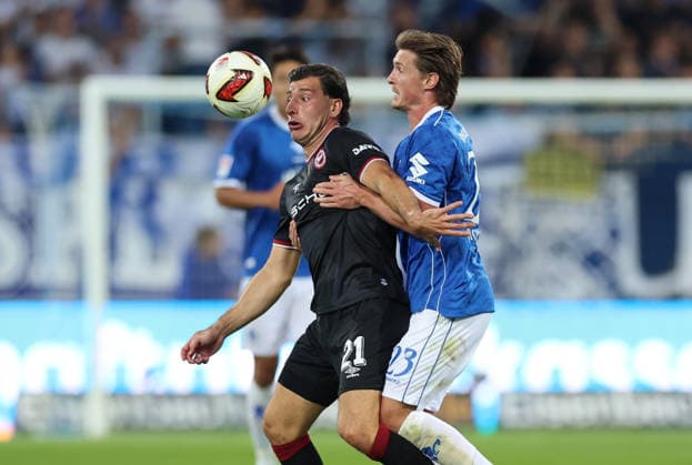 11.09.2026, Fussball 2. Bundesliga, SV Darmstadt 98 - DSC Arminia Bielefeld, v.l., Stefano Russo (Arminia Bielefeld), Carlo Sickinger (SV Darmstadt 98) DFL DFB REGULATIONS PROHIBIT ANY USE OF PHOTOGRAPHS AS IMAGE SEQUENCES AND OR QUASI-VIDEO. xdcx *** September 11, 2026, Soccer, 2. Bundesliga, SV Darmstadt 98 vs. DSC Arminia Bielefeld, from left: Stefano Russo (Arminia Bielefeld), Carlo Sickinger (SV Darmstadt 98). DFL and DFB regulations prohibit any use of photographs as image sequences and or quasi-video. xdcx Copyright: HMBxMedia Claus