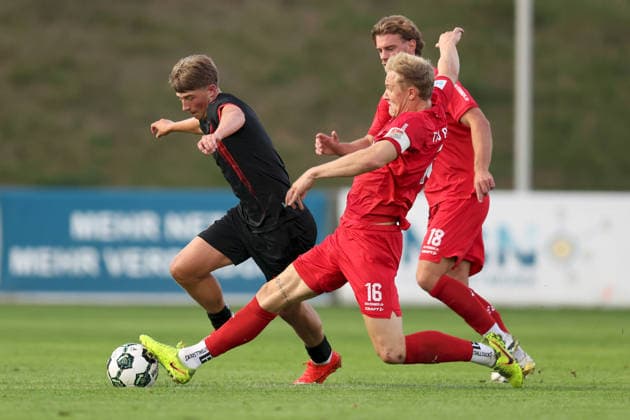 September 11, 2026, Men s Soccer, 2026–2027 Season, Bavarian Regional League, Matchday 8: TSV Aubstadt vs. SpVgg Unterhaching; Marinus Spann (46), SpVgg Unterhaching in a duel with Steffen Behr (16), TSV Aubstadt; Sulzfeld Schulstadion, Aubstadt; NGN Arena, Bavaria, Germany