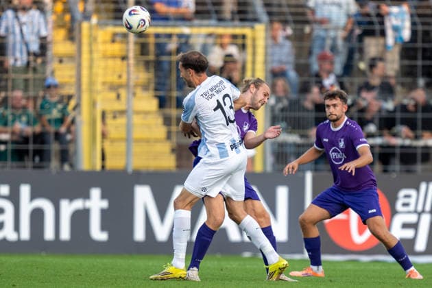 Michael Eberwein 13, TSV 1860 Munich; Rasmus Fackler, starting 11, TSV Schwaben Augsburg; TSV 1860 Munich vs. TSV Schwaben Augsburg, Soccer, Bavarian Regional League, Matchday 8, September 11, 2026. DFB regulations prohibit any use of photographs as image sequences and or quasi-video. Munich, Bavaria, Germany Copyright: xkolbert-press UlrichxGamelx