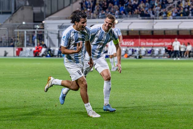 Dennis Dressel of TSV 1860 Munich (No. 14) celebrates with Tunay Deniz of TSV 1860 Munich (No. 36) after his goal made it 3–0 for Germany, TSV 1860 Munich vs. TSV Schwaben Augsburg, soccer, Bavarian Regional League, Matchday 8, 2026–2027 season, September 11, 2026 DFL and DFB regulations prohibit any use of photographs as image sequences and or quasi-video. Photo: HMB Media, Heike Feiner Copyright: HMBxMedia HeikexFeiner