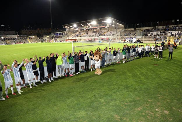 Soccer, Men s, Bavarian Regional League, 2026–2027 Season, TSV 1860 Munich vs. Schwaben Augsburg, Grünwalder Stadium: The TSV 1860 Munich team celebrating with fans in front of the West Stand after the game