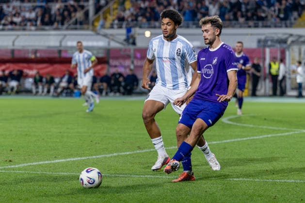 Battle for the Ball: Tackle between Arian Ortivero Calderon of TSV 1860 Munich, 12, and Elias Herzig of TSV 1847 Schwaben Augsburg, 24, GER, TSV 1860 Munich vs. TSV Schwaben Augsburg, Soccer, Bavarian Regional League, Matchday 8, 2026–2027 season, September 11, 2026. DFL and DFB regulations prohibit any use of photographs as image sequences and or quasi-video. Photo: HMB Media, Heike Feiner Copyright: HMBxMedia HeikexFeiner