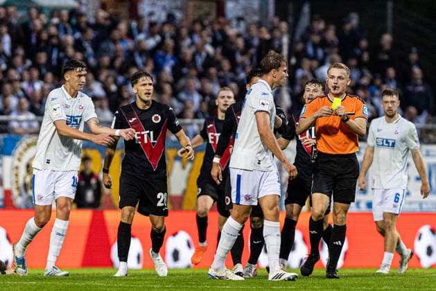 3rd Division: FC Viktoria Köln vs. Hansa Rostock, September 11, 2026; Florian Carstens (Hansa Rostock, No. 17) receives a yellow card; Sebastian Hilsberg (referee, Mainz); 3rd Division: FC Viktoria Köln vs. Hansa Rostock at Sportpark Höhenberg, Cologne, September 11, 2026. DFB regulations prohibit any use of photographs as image sequences and or quasi-video Copyright: xBEAUTIFULxSPORTS Buriakovx
