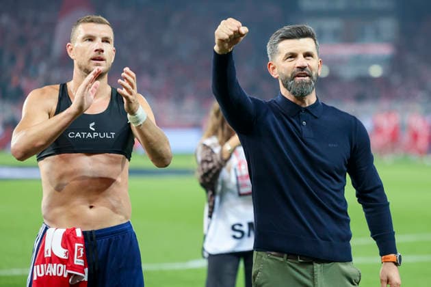 Edin Dzeko (FC Schalke 04) und Trainer Miron Muslic (FC Schalke 04) jubeln waehrend des Spiels der 1. Bundesliga zwischen 1. FC Union Berlin und FC Schalke 04, Stadion an der alten Foersterei am 11. September 2026 in Berlin, Deutschland. (Foto von Marco Steinbrenner DeFodi Images) +++ Edin Dzeko (FC Schalke 04) und Trainer Miron Muslic (FC Schalke 04) cheer during the Bundesliga match between 1. FC Union Berlin and FC Schalke 04 at Stadion an der alten Foersterei on September 11, 2026 in Berlin, Germany. (Photo by Marco Steinbrenner DeFodi Images) DFB DFL REGULATIONS PROHIBIT ANY USE OF PHOTOGRAPHS AS IMAGE SEQUENCES AND OR QUASI-VIDEO. (Photo by Marco Steinbrenner DeFodi Images) - *** Edin Dzeko of FC Schalke 04 and coach Miron Muslic of FC Schalke 04 celebrate during the Bundesliga match between 1. FC Union Berlin and FC Schalke 04 at Stadion an der alten Försterei on September 11, 2026, in Berlin, Germany. Photo by Marco Steinbrenner, DeFodi Images. Edin Dzeko of FC Schalke 04 and coach Miron Muslic of FC Schalke 04 cheer during the Bundesliga match between 1. FC Union Berlin and FC Schalke 04 at Stadion an der alten Försterei on September 11, 2026 in Berlin, Germany. Photo by Marco Steinbrenner, DeFodi Images. DFB and DFL regulations prohibit any use of photographs as image sequences and or quasi-video. Photo by Marco Steinbrenner, DeFodi Images