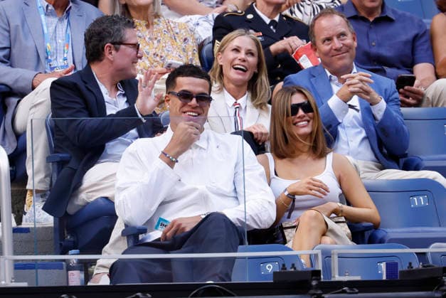 Brooklyn Nets player Michael Porter Jr. (front) and Julie Bowen watch the Men s semifinal in Arthur Ashe Stadium at the 2026 US Open Tennis Championship at the USTA Billie Jean King National Tennis Center in New York City on Friday, September 11, 2026.  NYP20260911826 JOHNxANGELILLO
